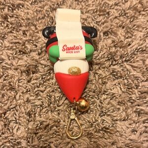 Santa's Nice List Keychain with Bell. Hand sanitizer holder.